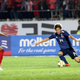 Japan’s Ito Junya, center, vies for the ball with Myanmar’s Soe Moe Kyaw, left, and Zaw Lin, right, qualifying soccer match in Yangon, Myanmar, in 2019.